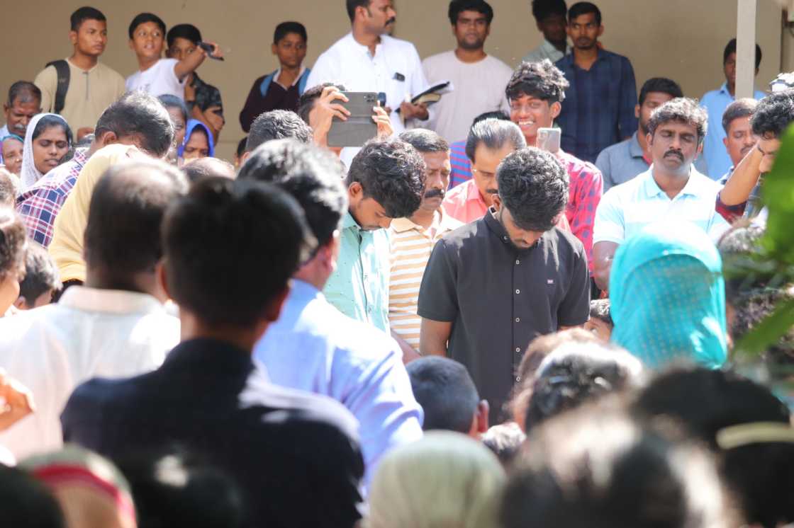 water baptism given by pastor to church believer