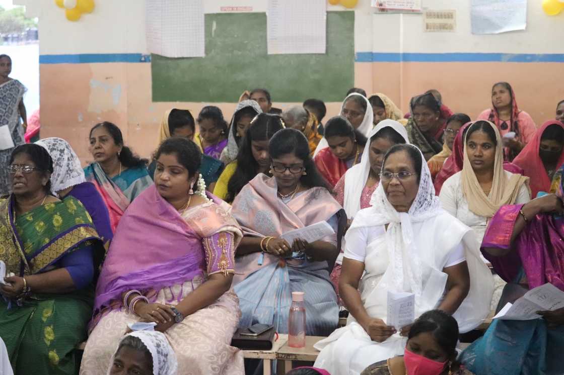 water baptism given by pastor to church believer