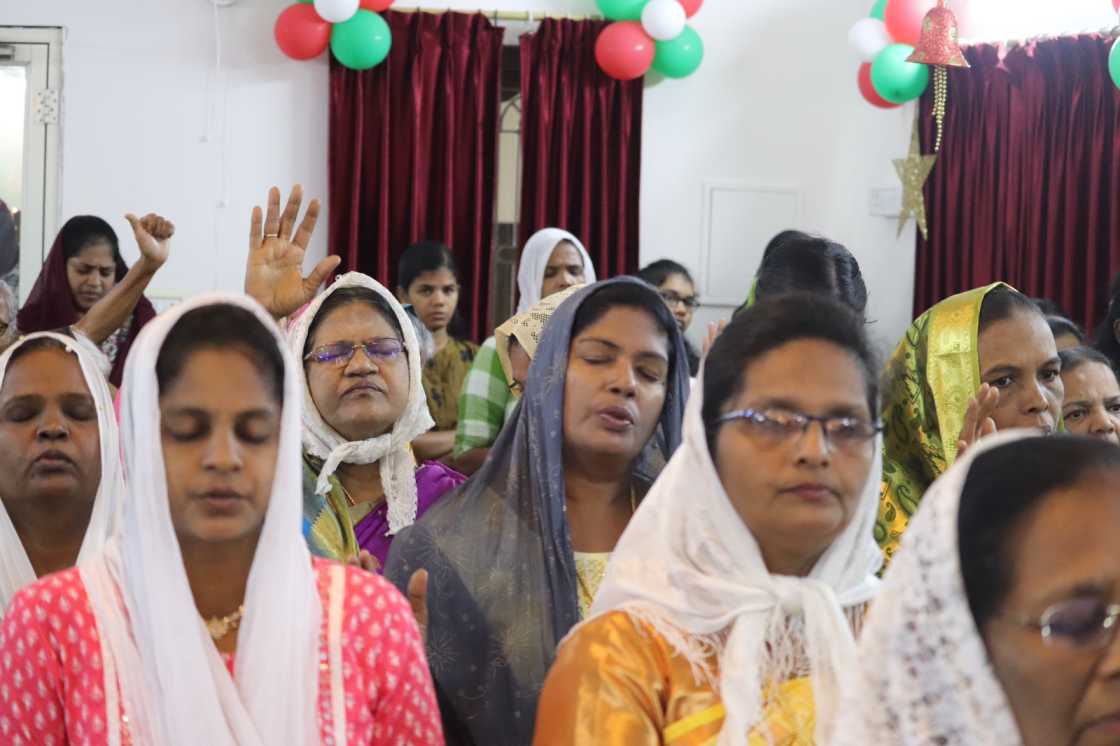 water baptism given by pastor to church believer